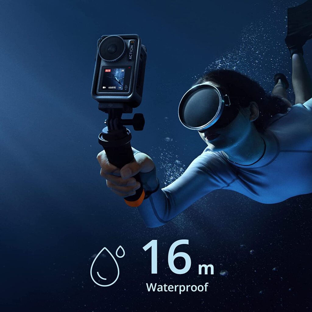 Person holding waterproof DJI Osmo Action 3 camera underwater.