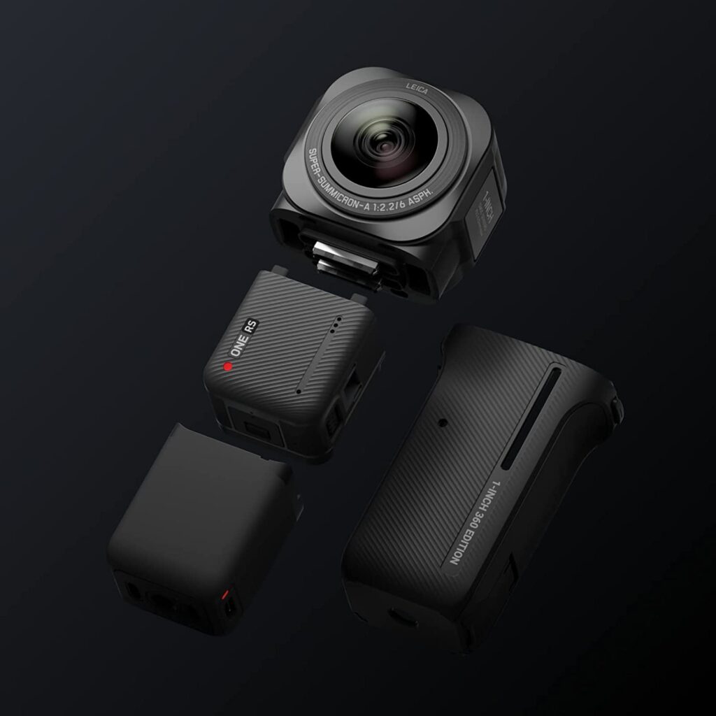 Black Insta360 ONE RS camera with a 360 lens sitting on a black table, Insta360 ONE RS 1-Inch 360