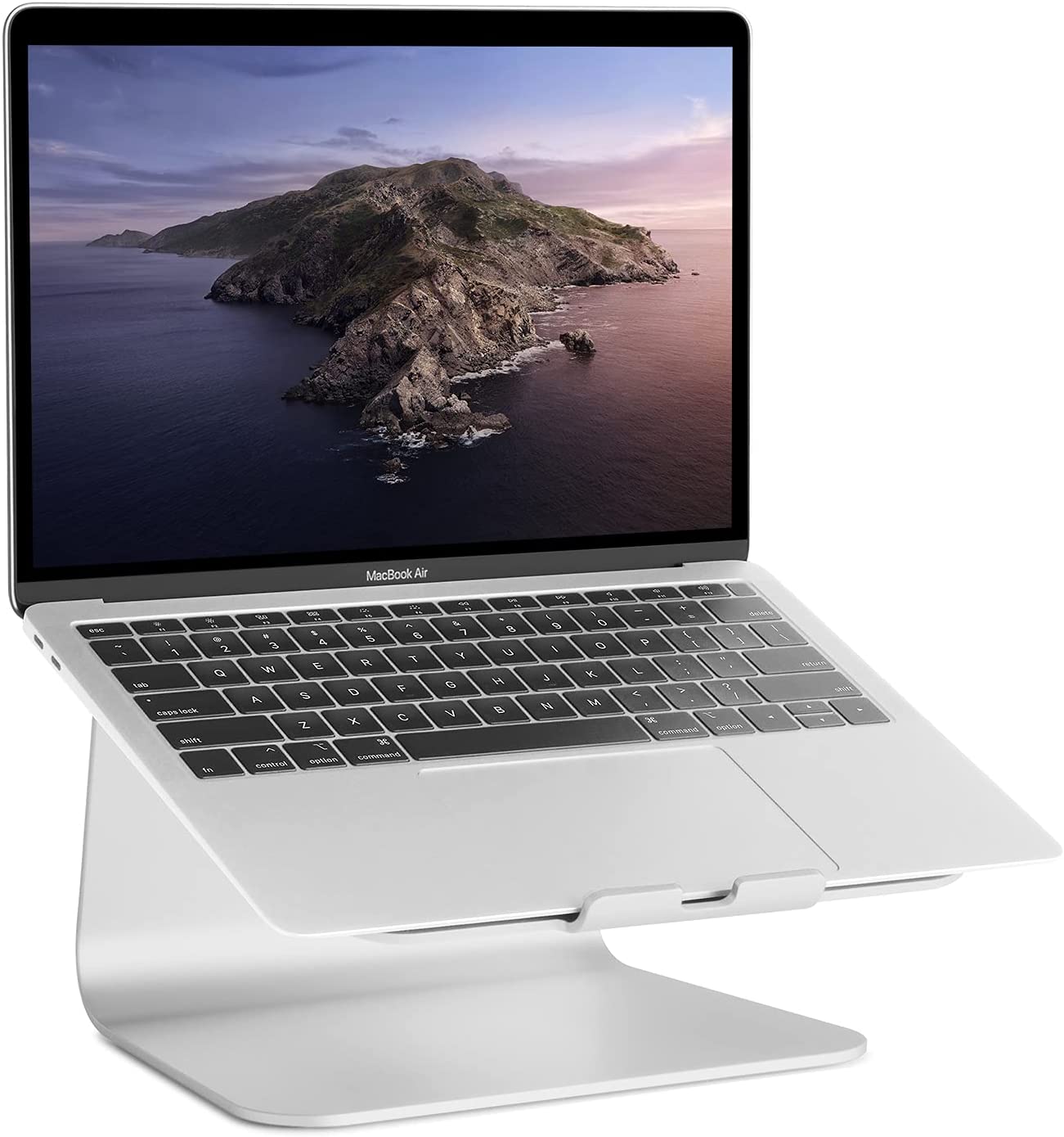 Laptop sitting on a stand with a screen of an island in the background, Rain Design mStand